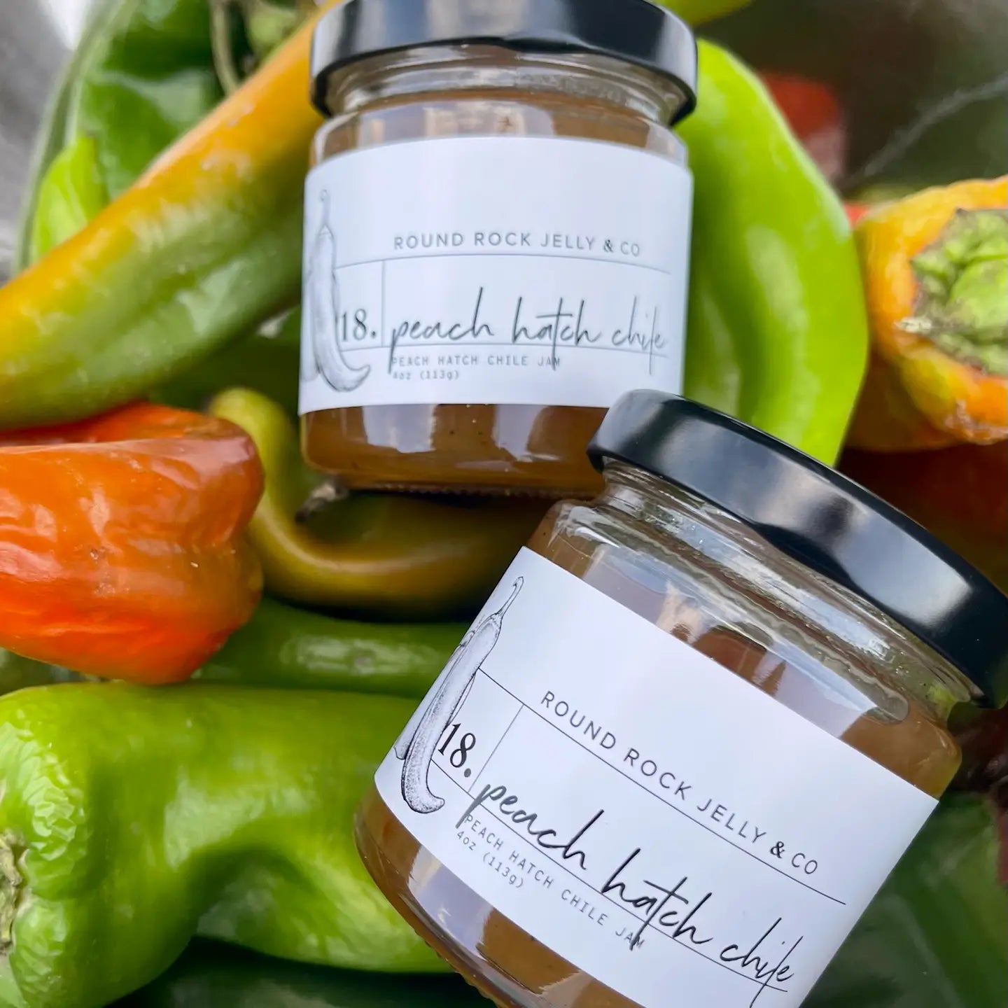 Round Rock Jelly CO-Peach Hatch Chile jam